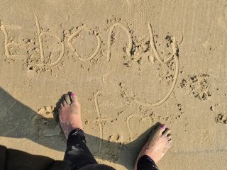 ebony feet on the sand