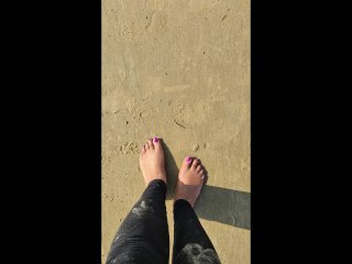 ebony feet on the sand