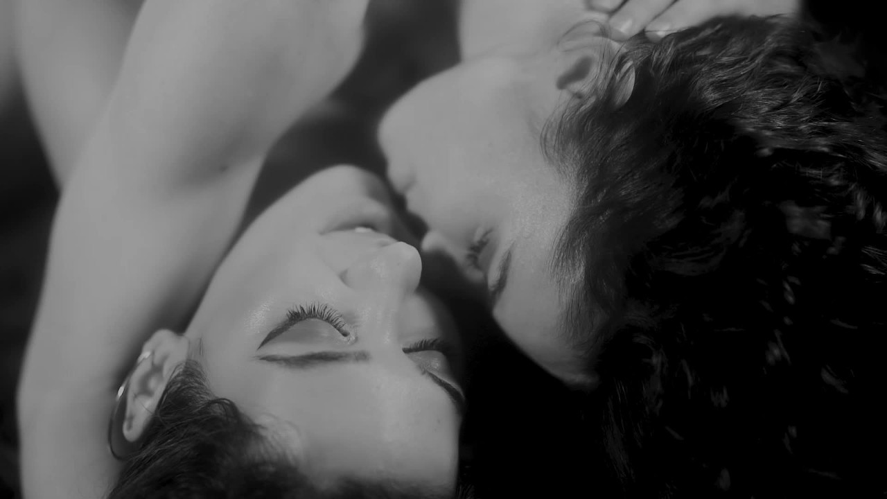Hot lesbian couple passionate kissing