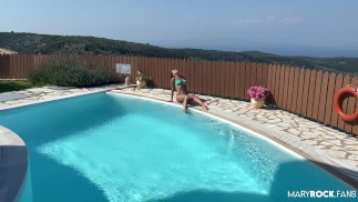 Beautiful bitch masturbates by the pool