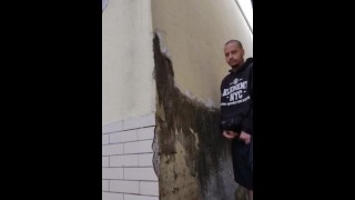 dude freeing a lot of pee in a wall