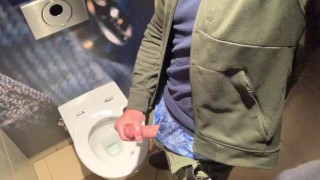 Jerking off in the train station toilet