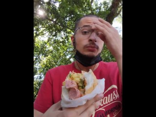 Eating a Big Hot Dog at the Park