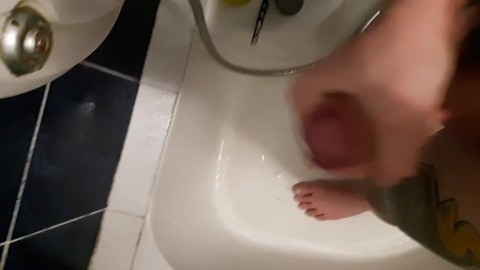 Boy cums in the shower