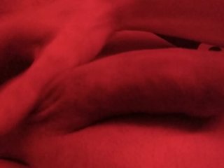 Playing with my balls and cock in pink light