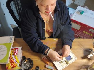 Sexy brunette smoking while rolling 3 fatties!