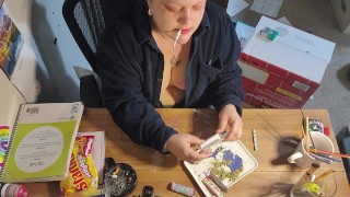 Sexy brunette smoking while rolling 3 fatties!