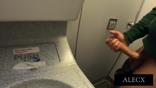 JERKING OFF AND CUMMING ON THE PLANE