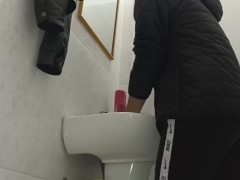Pissing beautiful brunette