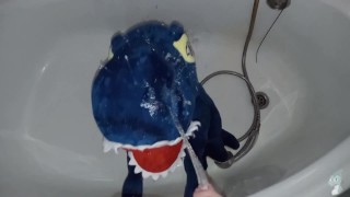 Blue dinosaur Peeing