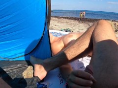 Video I jerk him off and cum at the beach people around us a girl surprises us