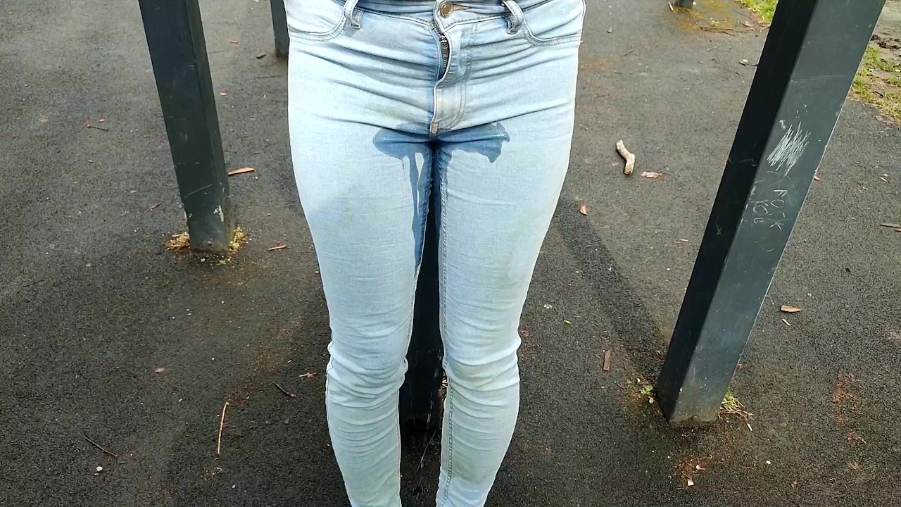 Nonchalantly peeing jeans in public