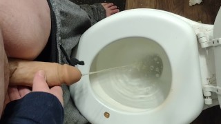 Transman pissing with STP prosthetics dick