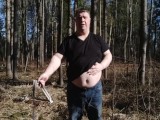 Undressing in a sunny spring forest for my fans
