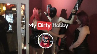 MyDirtyHobby - RedCatUgly & Her Friends Give A Guy His First Blowjob On An X Cross In Latex Dresses