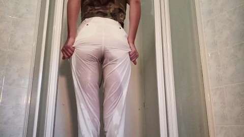 sexy girl pees in her pants and then her boyfriend pees on her