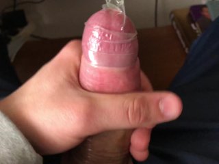 TEEN CUMS INSIDE A CONDOM