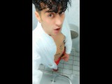 Jerk off at spa toilet in bathrobe before the pool