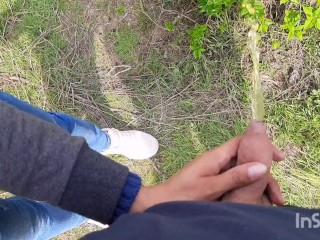 Holding his Cock in Public while he Pees