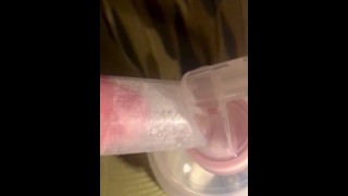 ( close up) Pumping breast milk