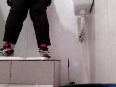 Hot milf pissing in public toilet