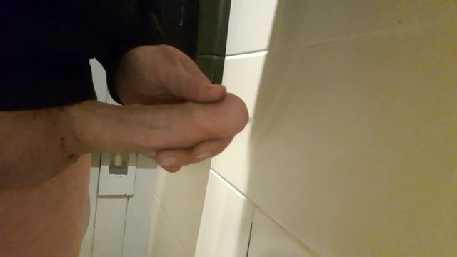 Cumshot in pub toilet
