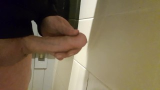 Cumshot in pub toilet