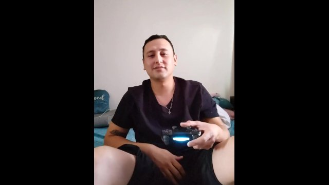 I was playing Play station, so I get horny and start to masturbate and come on my hand LOL