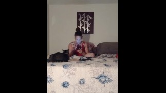 White milf smoking while watching videos on her phone