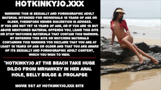 At The Beach Hotkinkyjo Takes A Huge Dildo From Mrhankey And Inserts It Into Her Anal Hole Causing A Belly Bulge And