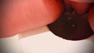 Pissing after taking a big cock