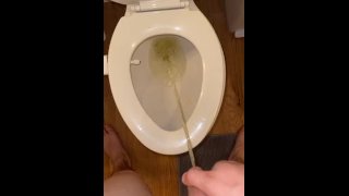 Pissing in a bathroom