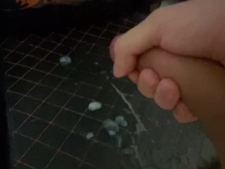 A young guy jerks off an uncut huge cock and ends up with a fountain of sperm