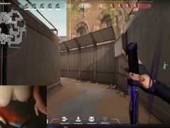 Gamer girl playing with big boobs while playing video game