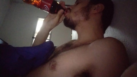 Drinking coca cola and burping