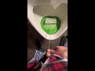 Pissing into a Urinal in a Pub. I Play Football with Urine
