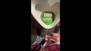 Pissing Into A Urinal In A Pub I Play Football With Urine