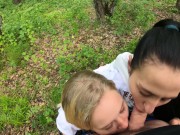 Preview 1 of Two Girlfriends Suck Cock in the Woods - Threesome Outdoor Blowjob - Public POV