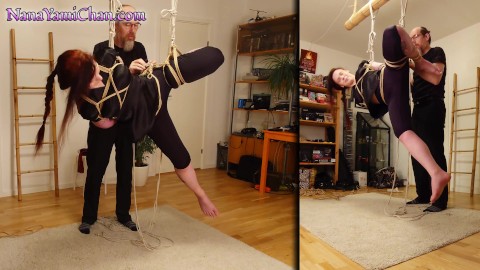 Shibari girl in side suspension; crotch rope, spanking and bastinado fun