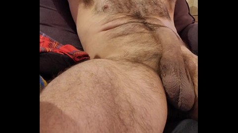 Close up of HAIRY MUSCLE BEAR STROKING COCK