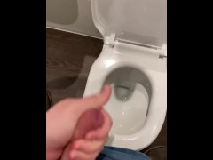 Wanking off in public cubicle with big cumshot at the end