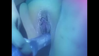 girl entertains her pussy with a rubber dildo and cums from it