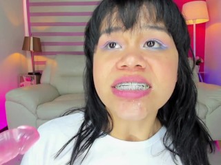 Lila Jordan plays with braces and suspenders