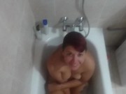 Preview 2 of Pissing again on girlfriend while she was sitting in the bathtub