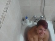 Preview 5 of Pissing again on girlfriend while she was sitting in the bathtub