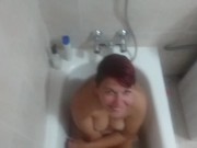 Preview 6 of Pissing again on girlfriend while she was sitting in the bathtub