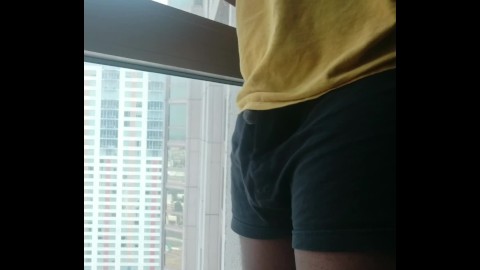 Chubby Young BBC Exhibitionist: Pissing and Cumming at Open Public Window in Hotel