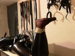 Crossdresser bondage hogtied in catsuit gagged and hooded