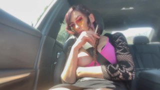 Car ride: Artemisia Love smoking with her big nipples out