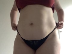 Round fat belly in a red dress